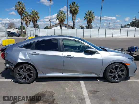 2019 Honda Civic Sedan Sport with VIN 2HGFC2F82KH519464, listed as a IAAI auction lot 41940030 with 59,718 mi miles. Bid and sale history available at carsss.com. Image 14.