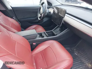 2020 Tesla Model 3 Long Range with VIN 5YJ3E1EB6LF784169, listed as a IAAI auction lot 40957226 with 96,415 mi miles. Bid and sale history available at carsss.com. Image 5.