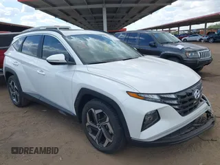 2022 Hyundai Tucson SEL z VIN 5NMJF3AE2NH062926, wystawiony jako IAAI lot #41969902 z przebiegiem 41 882 mil mil oraz . Historia ofert i sprzedaży dostępna na DreamBid. Obrazek 1.