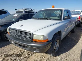 2002 Dodge Dakota with VIN 1B7GL12X32S701273, listed as a IAAI auction lot 41552573 with 157,212 mi miles and . Bid and sale history available at carsss.com. Image 2.