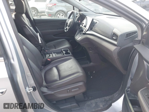 2018 Honda Odyssey EX-L z VIN 5FNRL6H72JB045639, wystawiony jako IAAI lot #41821993 z przebiegiem 60 737 mil mil oraz . Historia ofert i sprzedaży dostępna na DreamBid. Obrazek 5.
