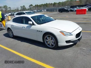 2014 Maserati Quattroporte GTS z VIN ZAM56PPA5E1072899, wystawiony jako IAAI lot #41809231 z przebiegiem 101 460 mil mil oraz . Historia ofert i sprzedaży dostępna na DreamBid. Obrazek 1.