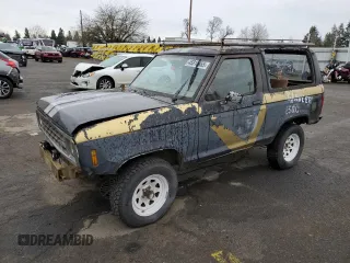 1987 Ford Bronco z VIN 1FMCU14T2HUA23081, wystawiony jako Copart lot #45816865 z przebiegiem 74 385 mil mil oraz Czysty tytuł • Clean title. Historia ofert i sprzedaży dostępna na DreamBid. Obrazek 1.