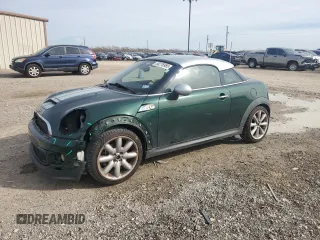 2012 MINI Coupe S z VIN WMWSX3C58CT465767, wystawiony jako Copart lot #88276985 z przebiegiem 113 023 mil mil oraz Szkody całkowita. Historia ofert i sprzedaży dostępna na DreamBid. Obrazek 1.