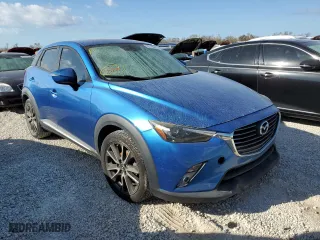 2016 Mazda CX-3 Grand Touring with VIN JM1DKDD74G0128911, listed as a Copart auction lot 62190022 with 61,562 mi miles. Bid and sale history available at carsss.com. Image 1.