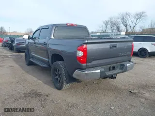 2018 Toyota Tundra 4WD SR5 with VIN 5TFDY5F14JX770184, listed as a IAAI auction lot 41303833 with 93,878 mi miles. Bid and sale history available at carsss.com. Image 3.