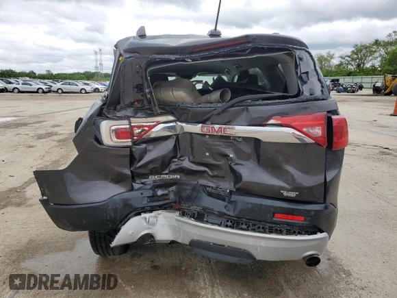 2017 GMC Acadia SLT with VIN 1GKKNMLS6HZ281974, listed as a Copart auction lot 57974395 with Not provided miles and Salvage title. Bid and sale history available at DreamBid. Image 6.