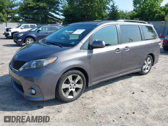 2012 Toyota Sienna SE with VIN 5TDXK3DCXCS267405, listed as a IAAI auction lot 42401101 with 134,553 mi miles and . Bid and sale history available at DreamBid. Image 2.