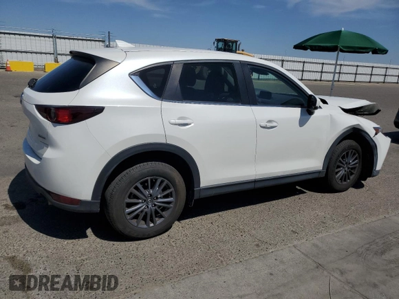 2020 Mazda CX-5 Touring z VIN JM3KFACM7L0833480, wystawiony jako Copart lot #58270225 z przebiegiem 46 061 mil mil oraz Szkoda całkowita • Salvage title. Historia ofert i sprzedaży dostępna na DreamBid. Obrazek 3.