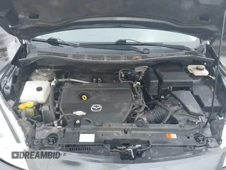 2015 Mazda 5 Sport with VIN JM1CW2BL3F0188052, listed as a IAAI auction lot 40777036 with 69,405 mi miles. Bid and sale history available at carsss.com. Image 10.