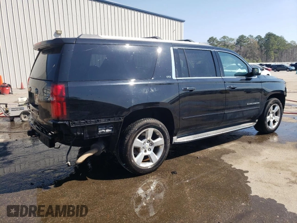2015 Chevrolet Suburban LTZ with VIN 1GNSKKKC2FR210780, listed as a Copart auction lot 47207445 with 163,448 mi miles and Salvage Title. Bid and sale history available at carsss.com. Image 3.