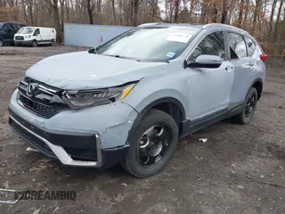 2021 Honda CR-V Touring with VIN 2HKRW2H90MH680172, listed as a IAAI auction lot 41708749 with 26,619 mi miles. Bid and sale history available at carsss.com. Image 17.