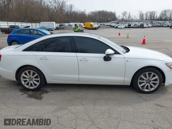 2013 Audi A6 Premium Plus z VIN WAUGGAFC3DN081065, wystawiony jako IAAI lot #41931342 z przebiegiem 136 570 mil mil oraz . Historia ofert i sprzedaży dostępna na DreamBid. Obrazek 13.