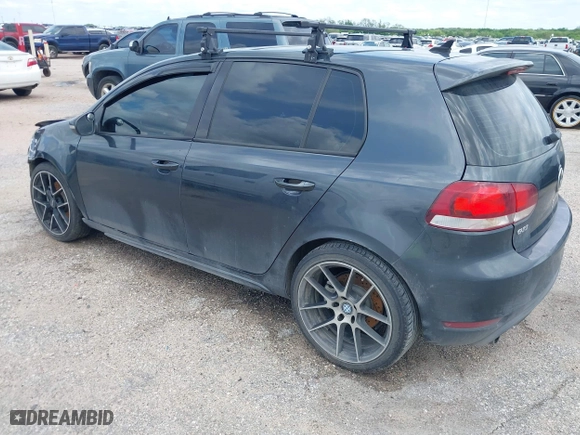 2010 Volkswagen GTI with VIN WVWHV7AJ0AW085361, listed as a IAAI auction lot 42083690 with 176,959 mi miles. Bid and sale history available at carsss.com. Image 3.