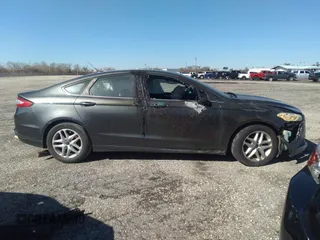 2016 Ford Fusion SE with VIN 3FA6P0HDXGR333108, listed as a IAAI auction lot 41065202 with 184,227 mi miles. Bid and sale history available at carsss.com. Image 13.