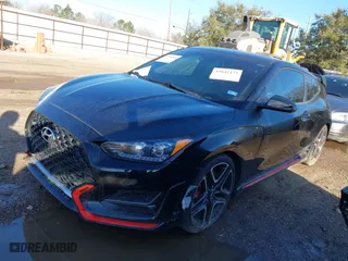2021 Hyundai Veloster N with VIN KMHT36AH3MU010222, listed as a IAAI auction lot 41754524 with 25,128 mi miles. Bid and sale history available at carsss.com. Image 2.