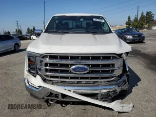 2023 Ford F-150 XL with VIN 1FTFW1E82PFB33122, listed as a Copart auction lot 58625905 with 21,184 mi miles and Salvage title. Bid and sale history available at DreamBid. Image 5.