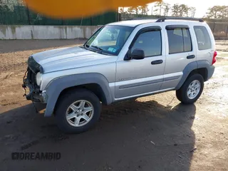 2002 Jeep Liberty Sport with VIN 1J4GL48K32W131467, listed as a IAAI auction lot 41485096 with 139,407 mi miles. Bid and sale history available at carsss.com. Image 2.