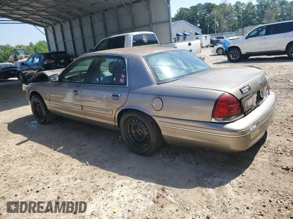 2003 Ford Crown Victoria LX z VIN 2FAFP74W33X141881, wystawiony jako Copart lot #54204695 z przebiegiem 98 466 mil mil oraz Szkoda całkowita • Salvage title. Historia ofert i sprzedaży dostępna na DreamBid. Obrazek 2.