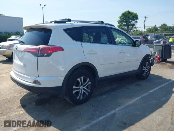 2017 Toyota RAV4 LE with VIN JTMBFREV8HJ157555, listed as a IAAI auction lot 42147300 with 81,187 mi miles and . Bid and sale history available at DreamBid. Image 4.