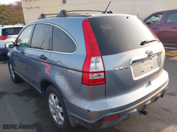 2008 Honda CR-V EX with VIN 3CZRE38568G706370, listed as a IAAI auction lot 41031674 with 124,494 mi miles. Bid and sale history available at carsss.com. Image 3.