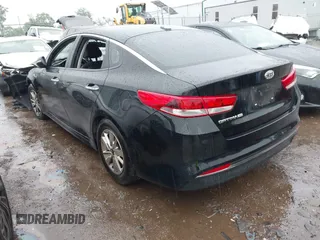 2016 Kia Optima LX with VIN 5XXGT4L33GG033327, listed as a IAAI auction lot 42389008 with 70,803 mi miles and . Bid and sale history available at DreamBid. Image 3.