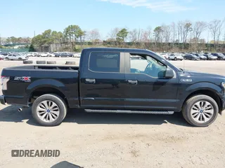 2018 Ford F-150 XL with VIN 1FTEW1EP2JFE13018, listed as a IAAI auction lot 42040276 with 97,563 mi miles. Bid and sale history available at carsss.com. Image 13.