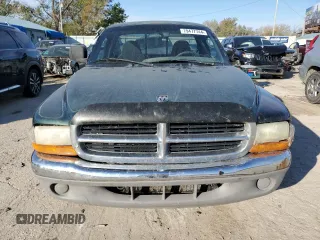 2000 Dodge Dakota z VIN 1B7FL26X5YS793314, wystawiony jako Copart lot #79477744 z przebiegiem 358 319 mil mil oraz Szkoda całkowita • Salvage title. Historia ofert i sprzedaży dostępna na DreamBid. Obrazek 5.