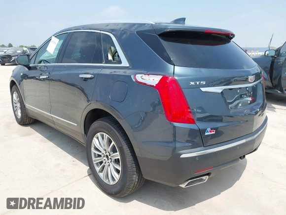 2019 Cadillac XT5 Luxury FWD z VIN 1GYKNCRS1KZ259282, wystawiony jako IAAI lot #41921030 z przebiegiem 27 880 mil mil oraz . Historia ofert i sprzedaży dostępna na DreamBid. Obrazek 3.