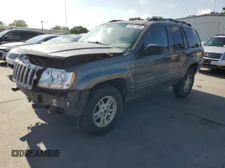 2004 Jeep Grand Cherokee Laredo with VIN 1J4GW48S04C269463, listed as a Copart auction lot 54611885 with 155,675 mi miles and Salvage title. Bid and sale history available at DreamBid. Image 1.