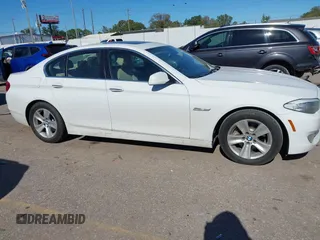 2013 BMW 5 Series 528i with VIN WBAXG5C56DDY31982, listed as a IAAI auction lot 40906428 with 248,336 mi miles and . Bid and sale history available at carsss.com. Image 12.
