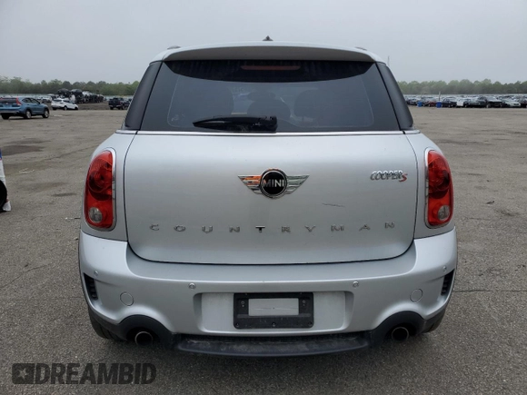 2015 MINI Countryman S z VIN WMWZC3C58FWT06471, wystawiony jako Copart lot #57570585 z przebiegiem 101 963 mil mil oraz Tytuł czysty. Historia ofert i sprzedaży dostępna na DreamBid. Obrazek 6.