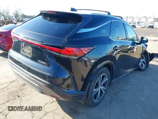 2023 Lexus RX 350 with VIN 2T2BAMBAXPC005107, listed as a IAAI auction lot 42287535 with 51,672 mi miles and . Bid and sale history available at DreamBid. Image 4.