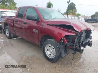 2021 Ram 1500 Tradesman with VIN 1C6RR6FG2MS512896, listed as a IAAI auction lot 40779033 with 62,030 mi miles and . Bid and sale history available at DreamBid. Image 1.
