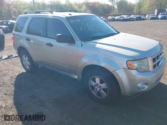 2010 Ford Escape XLT with VIN 1FMCU9D75AKB64794, listed as a IAAI auction lot 42141609 with 118,791 mi miles. Bid and sale history available at carsss.com. Image 1.