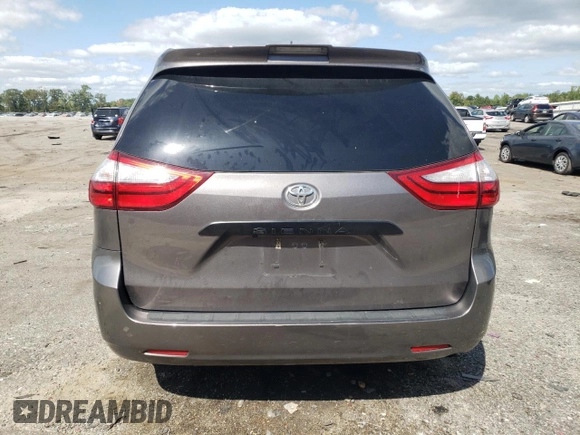 2019 Toyota Sienna L with VIN 5TDZZ3DC8KS006907, listed as a Copart auction lot 70310274 with 73,234 mi miles and Salvage Title. Bid and sale history available at carsss.com. Image 6.