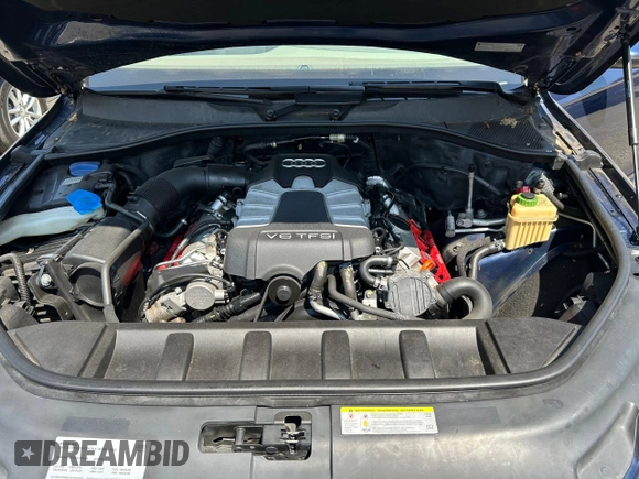2012 Audi Q7 S line with VIN WA1DGAFE6CD008357, listed as a Copart auction lot 60036955 with 98,599 mi miles and Clean title. Bid and sale history available at DreamBid. Image 7.