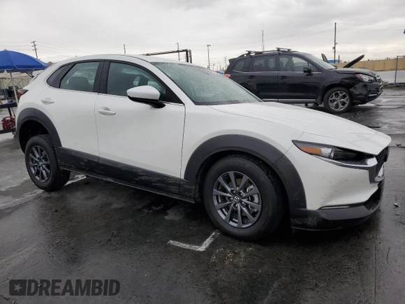 2023 Mazda CX-30 S with VIN 3MVDMBAM4PM522056, listed as a Copart auction lot 49122975 with 16,624 mi miles and Salvage title. Bid and sale history available at DreamBid. Image 4.