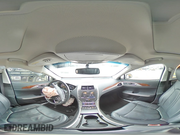 2015 Lincoln MKZ with VIN 3LN6L2J99FR602863, listed as a Copart auction lot 56679335 with 33,859 mi miles and Salvage title. Bid and sale history available at DreamBid. Image 14.