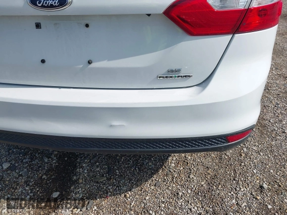 2013 Ford Focus SE with VIN 1FADP3F23DL208410, listed as a IAAI auction lot 42542892 with 111,392 mi miles and . Bid and sale history available at DreamBid. Image 6.