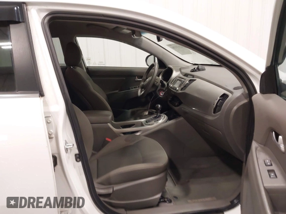 2015 Kia Sportage EX with VIN KNDPCCAC6F7786029, listed as a IAAI auction lot 42133596 with 71,196 mi miles and . Bid and sale history available at DreamBid. Image 5.