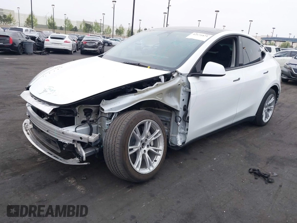 2023 Tesla Model Y Long Range z VIN 7SAYGDEE5PA063097, wystawiony jako IAAI lot #42171871 z przebiegiem Nie podano mil oraz . Historia ofert i sprzedaży dostępna na DreamBid. Obrazek 2.