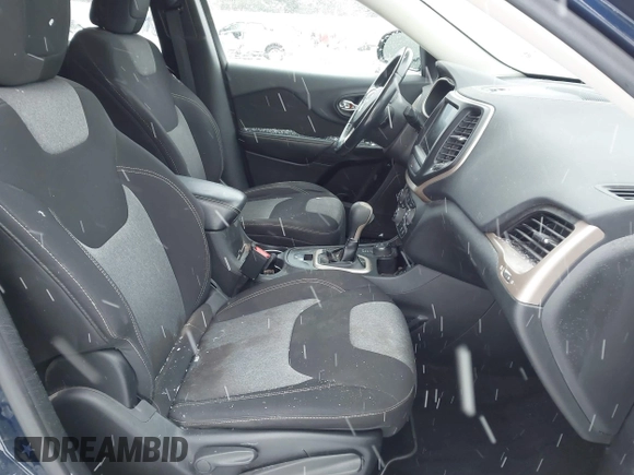 2014 Jeep Cherokee Altitude with VIN 1C4PJMCB9EW187288, listed as a IAAI auction lot 41320161 with 169,534 mi miles and . Bid and sale history available at DreamBid. Image 5.