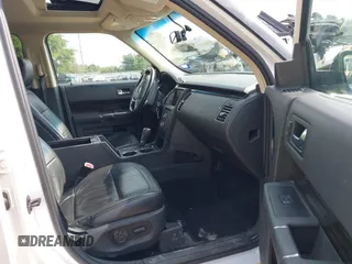 2014 Ford Flex SEL z VIN 2FMGK5C8XEBD00203, wystawiony jako IAAI lot #42304671 z przebiegiem 109 639 mil mil oraz . Historia ofert i sprzedaży dostępna na DreamBid. Obrazek 5.