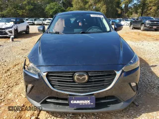 2021 Mazda CX-3 Sport with VIN JM1DKDB78M1515924, listed as a Copart auction lot 43688325 with 56,271 mi miles and Salvage Title. Bid and sale history available at carsss.com. Image 5.