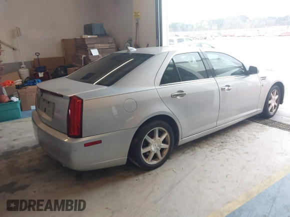 2011 Cadillac STS RWD with VIN 1G6DW6ED4B0120517, listed as a IAAI auction lot 41765069 with 120,059 mi miles and . Bid and sale history available at DreamBid. Image 4.