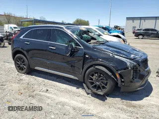 2021 Cadillac XT4 FWD Premium Luxury с VIN 1GYFZCR4XMF004996, выставлен на аукционе Copart как лот 61270355 с пробегом Не указан миль и Списание • Salvage title. История ставок и продаж доступна на DreamBid. Изображение 4.