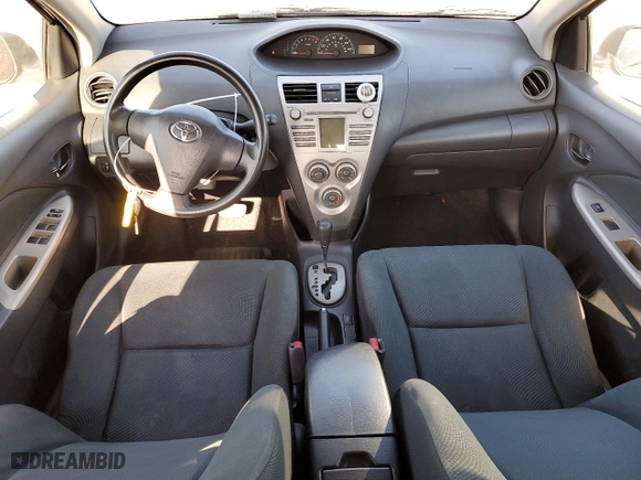 2010 Toyota Yaris with VIN JTDBT4K35A1375473, listed as a Copart auction lot 51978665 with 247,552 mi miles and Salvage Title. Bid and sale history available at carsss.com. Image 8.