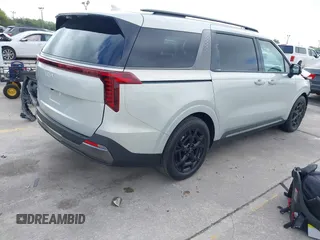 2025 Kia Carnival SX with VIN KNDNE5K38S6462298, listed as a IAAI auction lot 41913088 with 9,671 mi miles and . Bid and sale history available at carsss.com. Image 4.