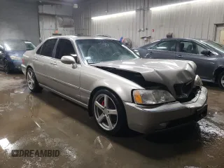 2002 Acura RL z VIN JH4KA96502C012064, wystawiony jako Copart lot #88080895 z przebiegiem 107 477 mil mil oraz Szkoda całkowita • Salvage title. Historia ofert i sprzedaży dostępna na DreamBid. Obrazek 4.